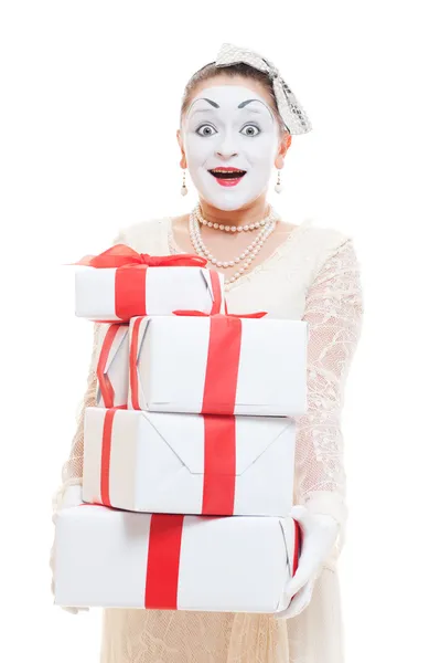 Mime woman holding many boxes of presents — Stock Photo, Image