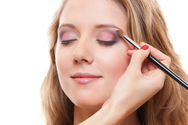Lovely young woman having make up — Stock Photo, Image