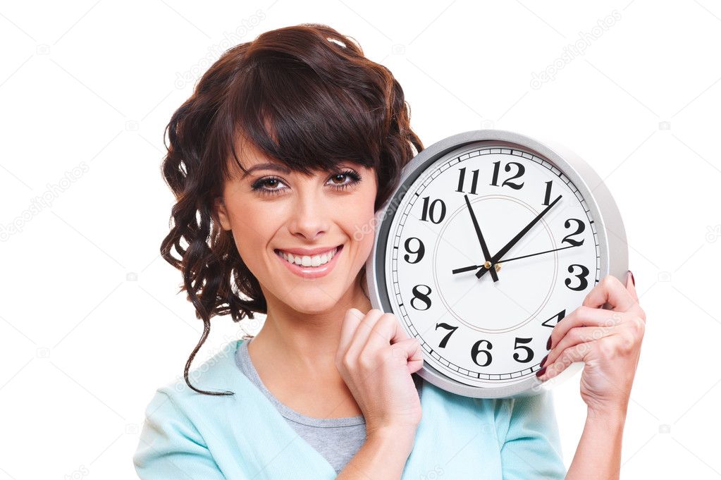 Happy young woman with clock