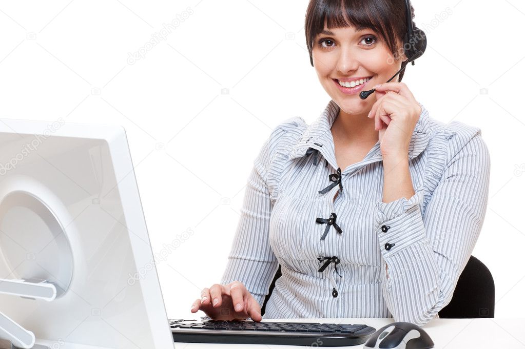 Smiley telephone operator at workplace