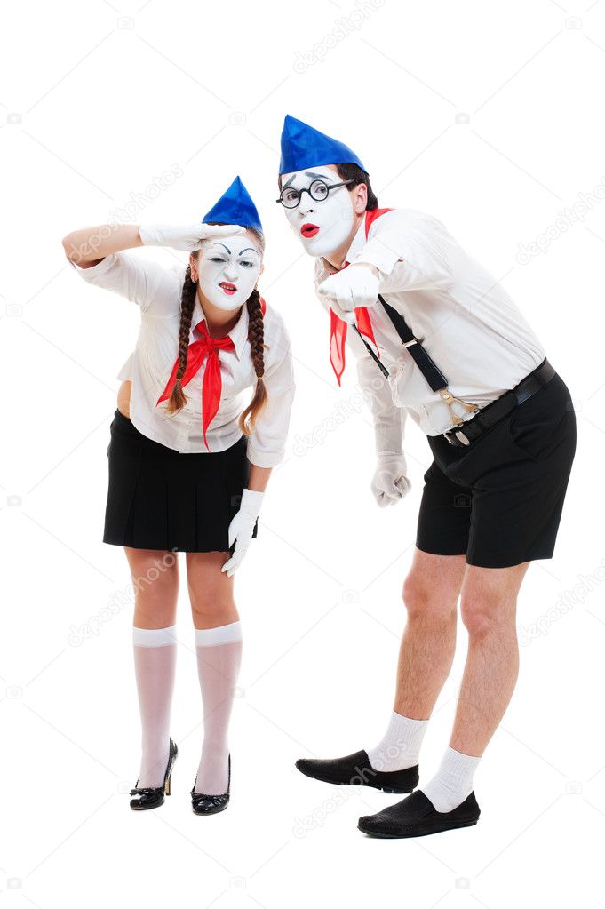 Two mimes looking at something