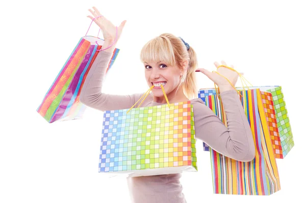 Blonde met shopping tassen — Stockfoto