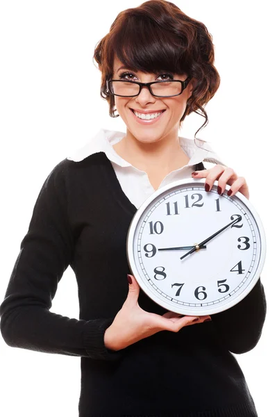 Businesswoman holding clock — Stock Photo, Image