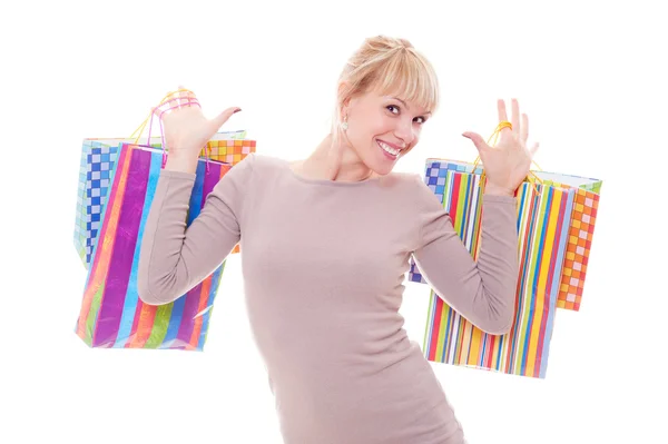 Gelukkig blonde met shopping tassen — Stockfoto