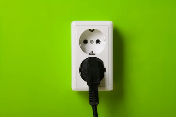 stock image White electric socket on the wall.