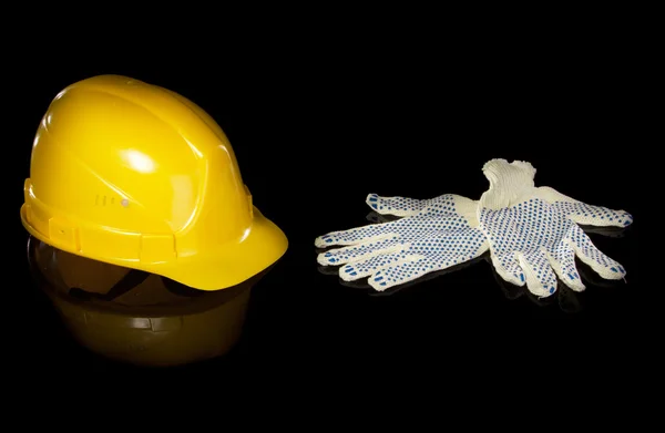 Шляпа и рабочие перчатки — стоковое фото