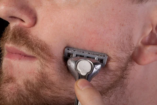 Men shaving faces. Close-up. — Stock Photo, Image