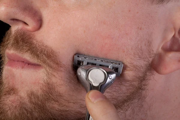 stock image Men shaving faces. Close-up.