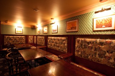 Irish pub. interior with artificial light clipart