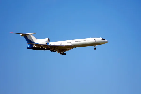 Aircraft against the blue sky — Stock Photo, Image