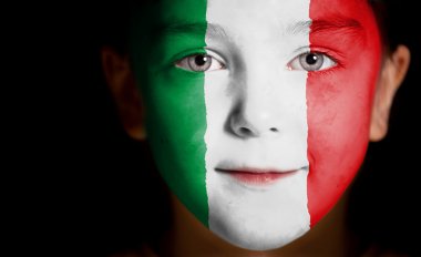 Child face painted with the flag of Italy. clipart