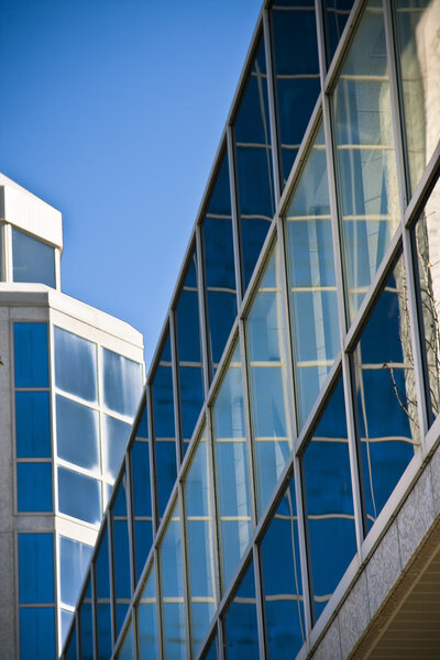 Modern building with blue reflective windows