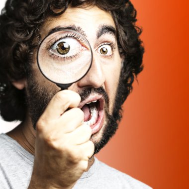 Man with magnifying glass clipart