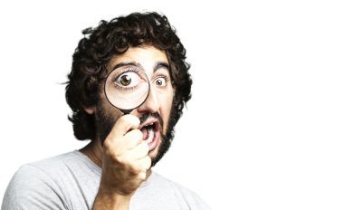 Man with magnifying glass clipart