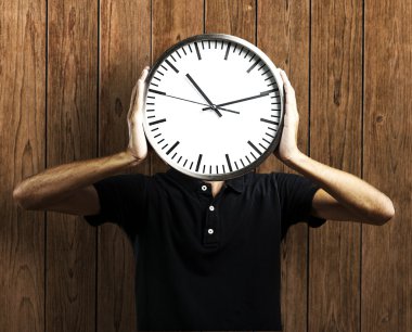 Man holding clock clipart