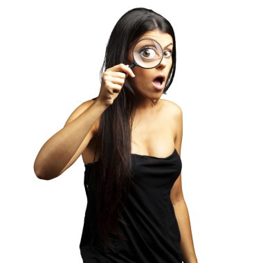 Portrait of young woman surprised looking through a magnifying g clipart