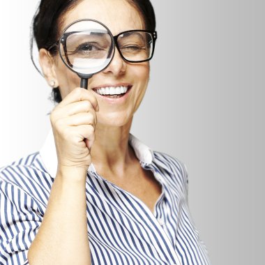 Woman with magnifying glass clipart