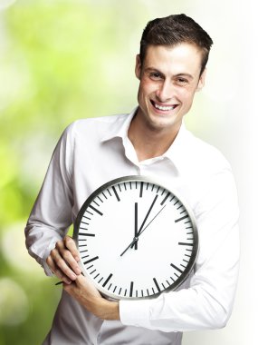 Man holding clock clipart