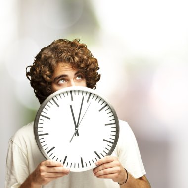 Man hidden behind clock clipart