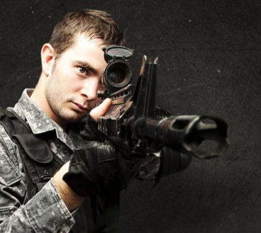 Young soldier aiming clipart