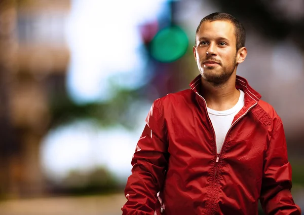 Man with red jacket — Stock Photo, Image