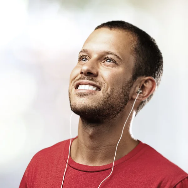 Young man listen music