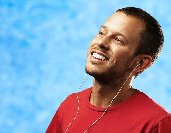Young man listen music — Stock Photo, Image