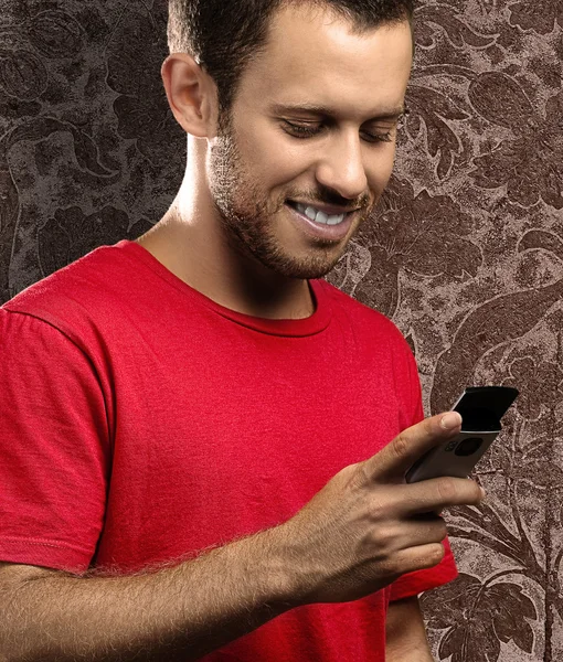 Young man with mobile — Stock Photo, Image