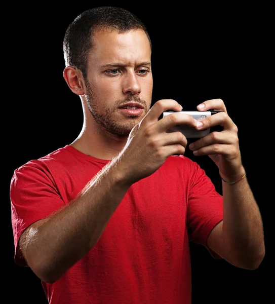 Νεαρός άνδρας πληκτρολογώντας — Φωτογραφία Αρχείου
