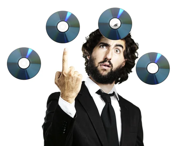 Man and cds flying — Stock Photo, Image