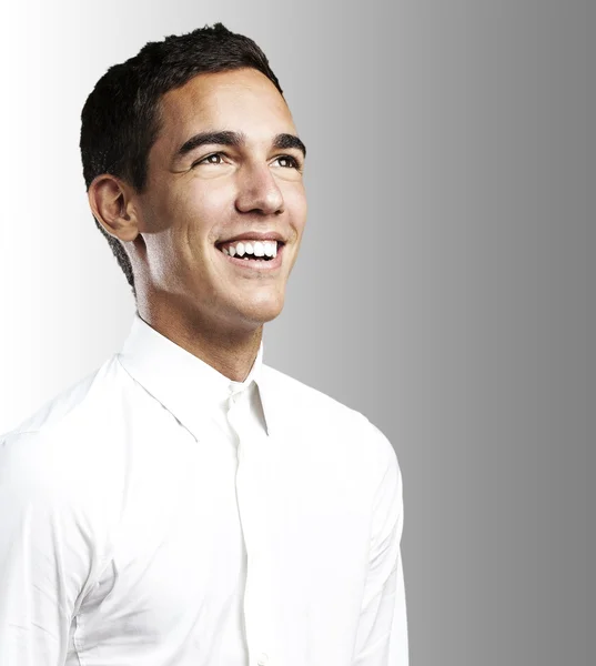 Young man smiling — Stock Photo, Image