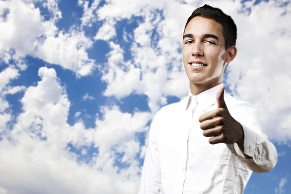 Young man with thumb up — Stock Photo, Image
