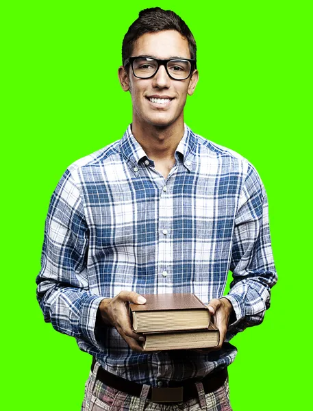 Man holding books — Stock Photo, Image