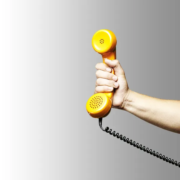 Hand som håller telefon — Stockfoto