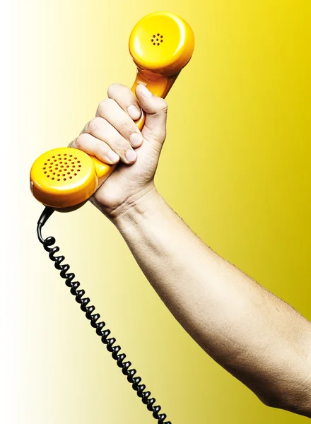 Mão segurando telefone — Fotografia de Stock