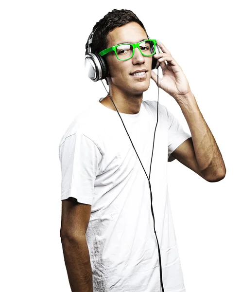 Fiatalember zenét hallgat. — Stock Fotó
