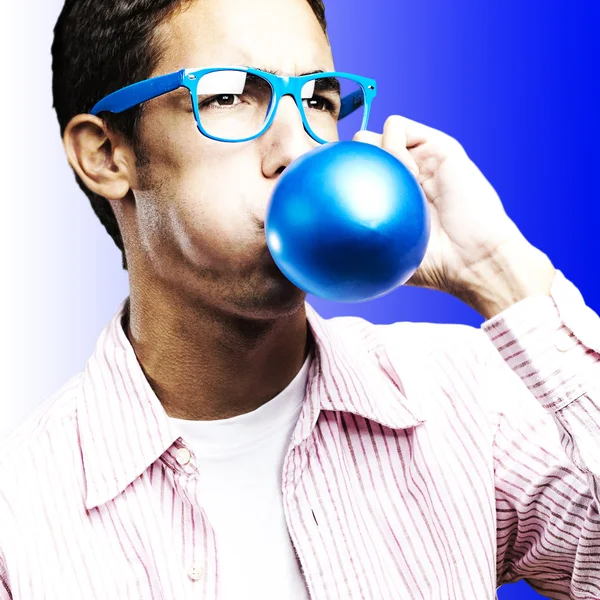 Young man with balloon — Stock Photo, Image