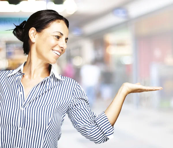 Woman holding gesture — Stock Photo, Image