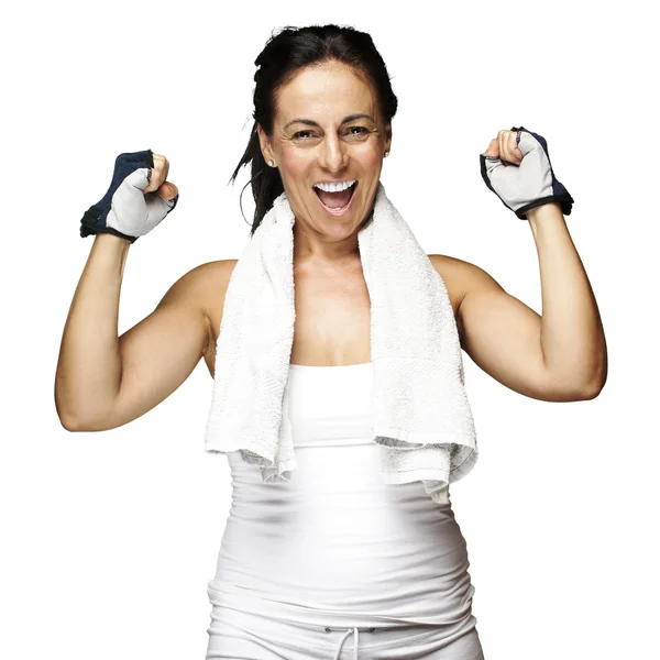 Portrait of a middle aged woman gesturing win symbol over white — Stock Photo, Image