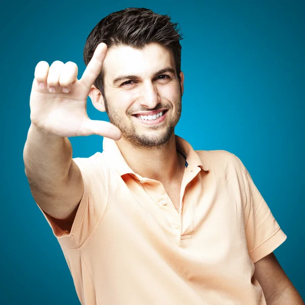 Man gesturing success — Stock Photo, Image
