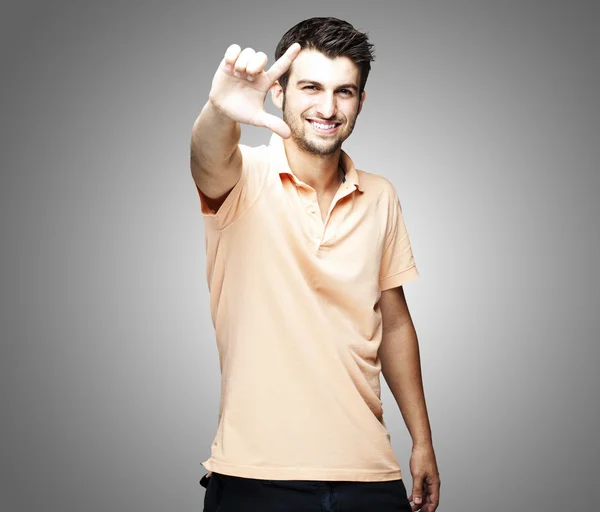 Young man gesturing — Stock Photo, Image