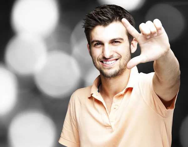 Man gesturing success symbol — Stock Photo, Image