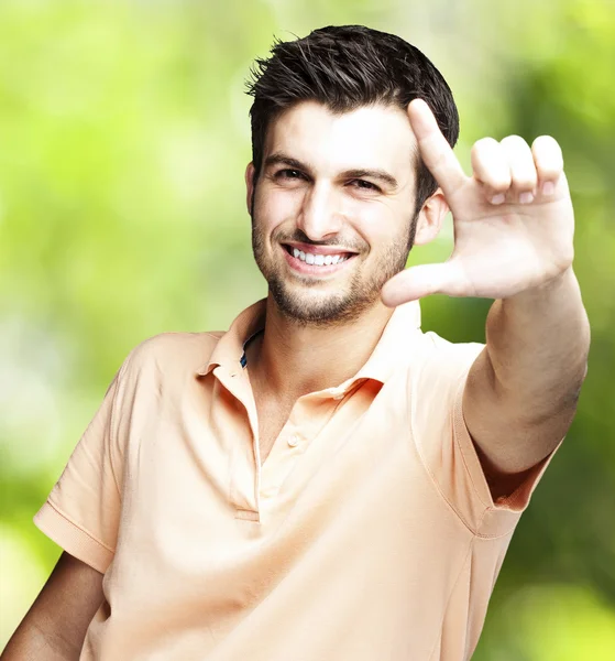 Young man gesturing — Stock Photo, Image