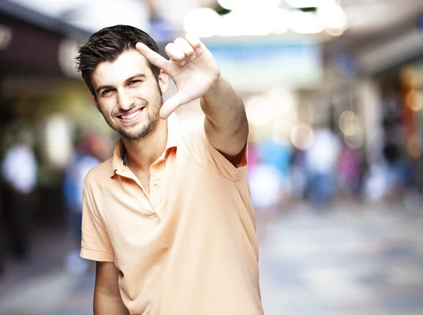 Man gesturing success symbol — Stock Photo, Image