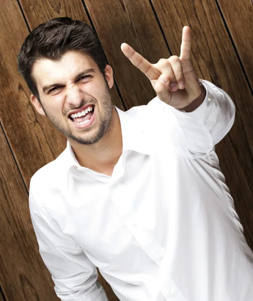 Man gesturing rock and roll — Stock Photo, Image