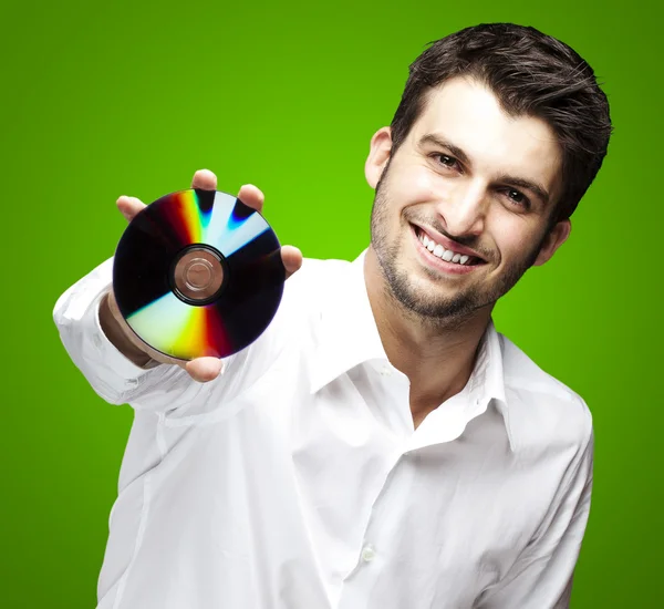 Man holding cd — Stok fotoğraf