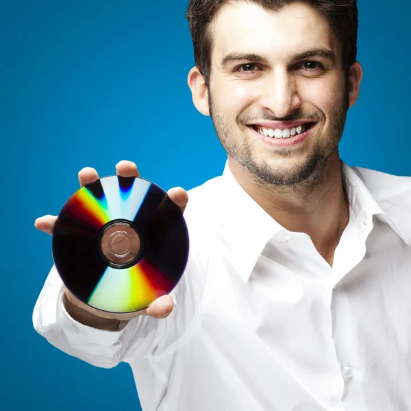 Man holding cd — Stock Photo, Image