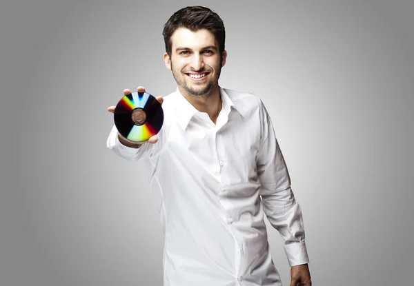 Man holding cd — Stok fotoğraf