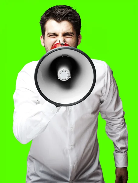 Homem gritando com megafone — Fotografia de Stock