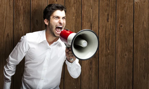 Man shouting with megaphone — Stock Photo, Image